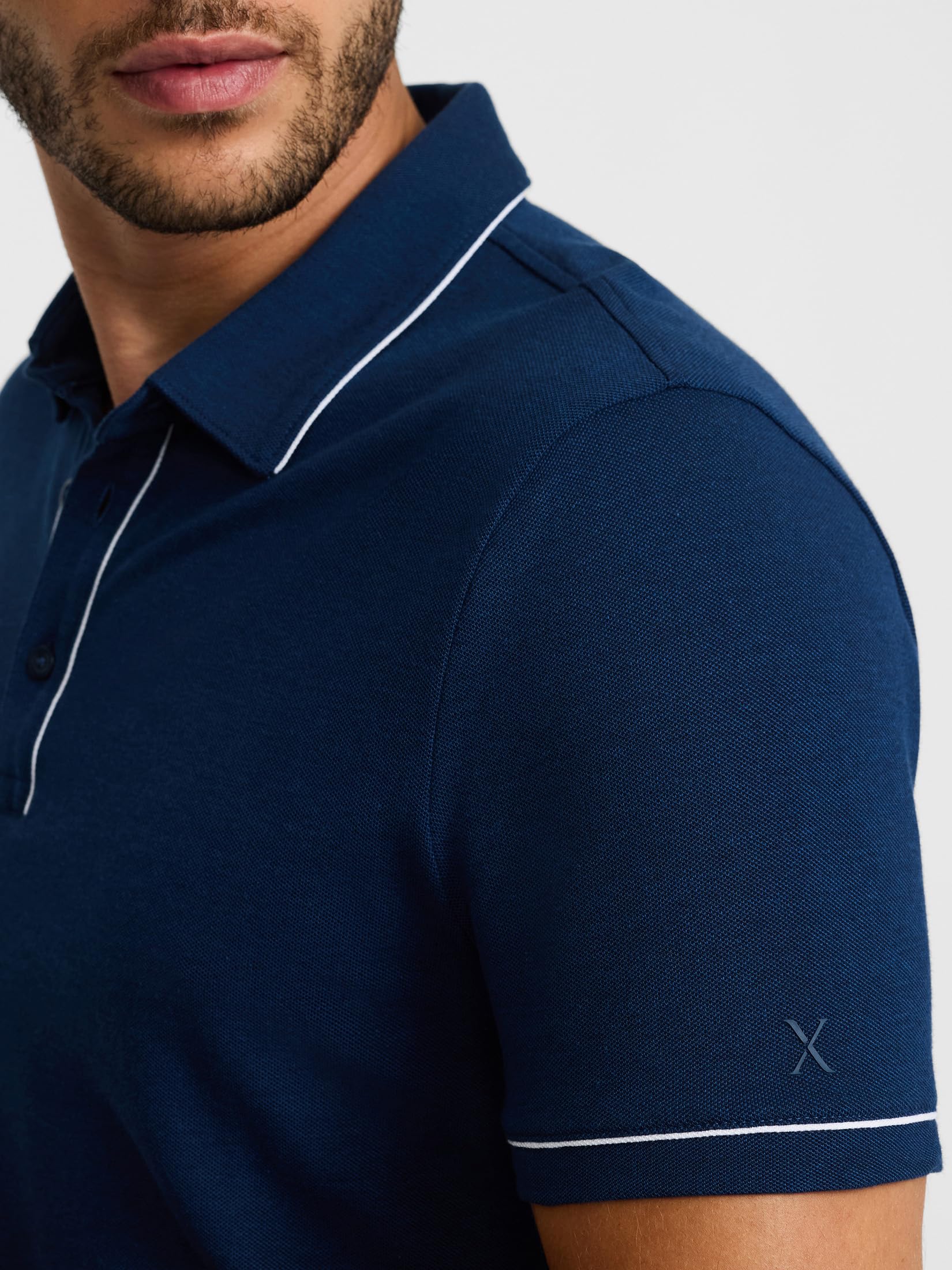 EXPRESS Men’s Luxe Pique Polo – Short Sleeve Soft Cotton Blend Shirt with Piped Collar and Tennis Tail Hem - Image 4